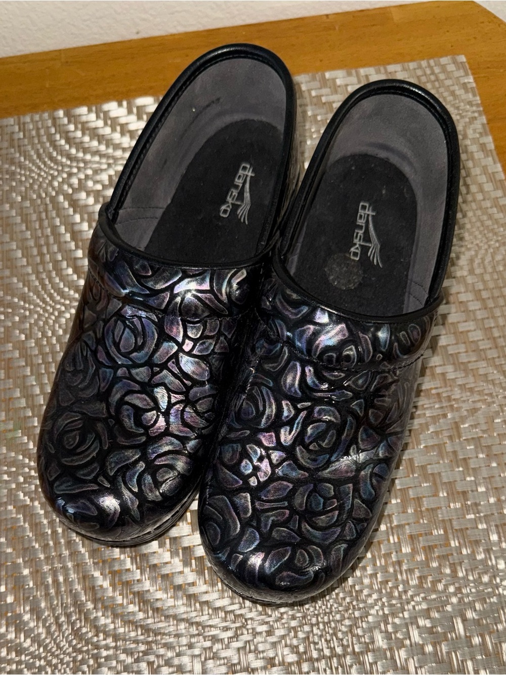Dansko Women's Iridescent Black Floral-Embossed Clog
